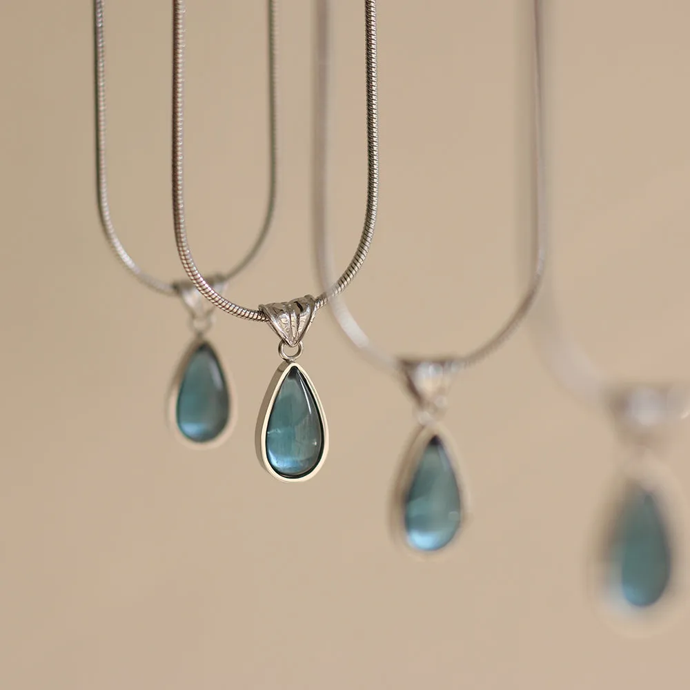 Gold-Plated Teardrop Pendant Necklace with Blue Synthetic Cat Eye Stone