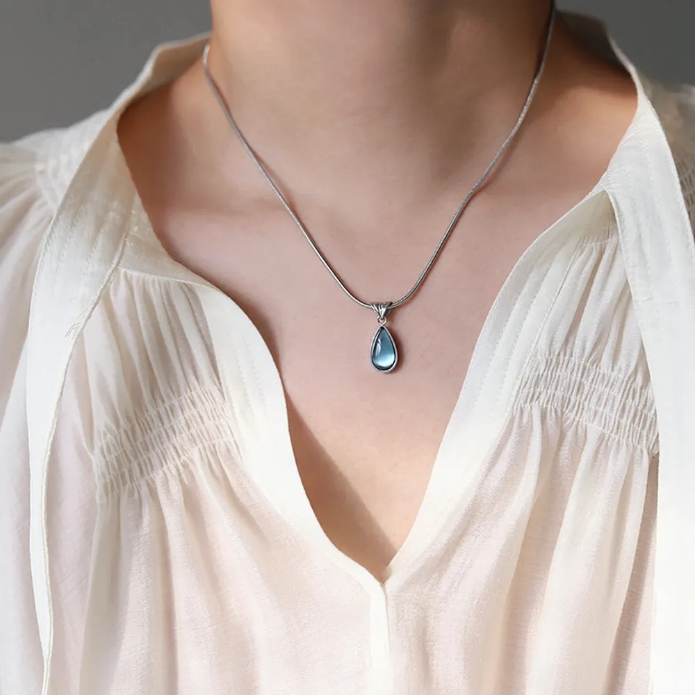 Gold-Plated Teardrop Pendant Necklace with Blue Synthetic Cat Eye Stone